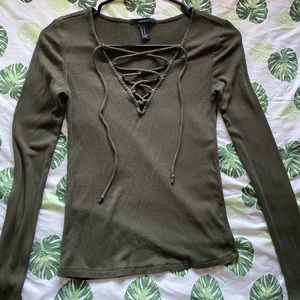 Olive green long sleeve with eloquence in front